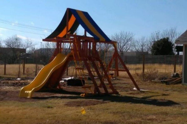 Classic Backyard Playcenter. The playground was installed by River City Play Systems in Buda, TX which is just outside of Austin, TX. Let us install your playground!