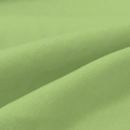 Close-up of green fabric with folds