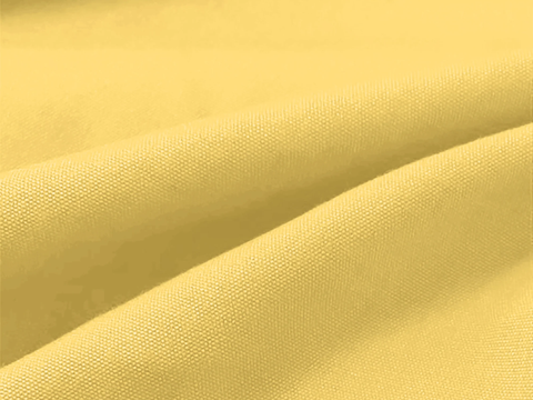 Close-up of yellow fabric with a textured pattern