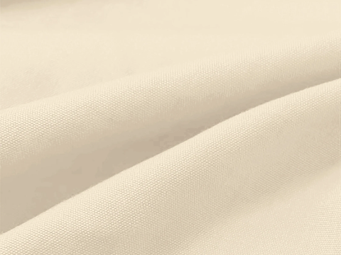 Close-up of beige fabric with a subtle texture