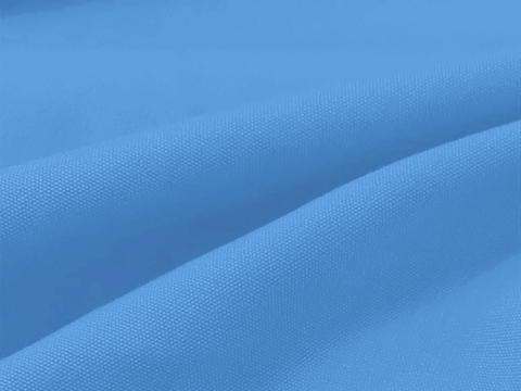 Close-up of blue fabric with a textured pattern