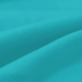 Close-up of turquoise fabric with folds