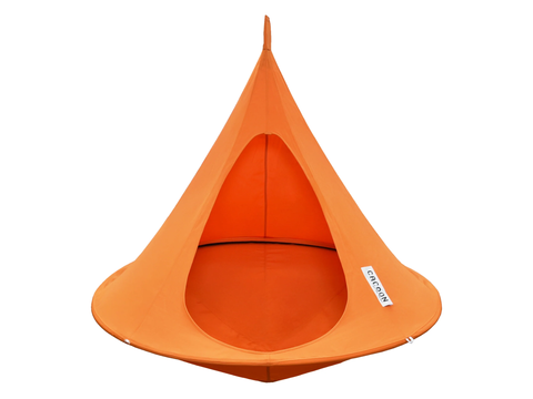 Orange hanging chair with a visible brand label on a white background