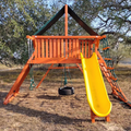 Children's playground set with a yellow slide and swings in an outdoor setting.