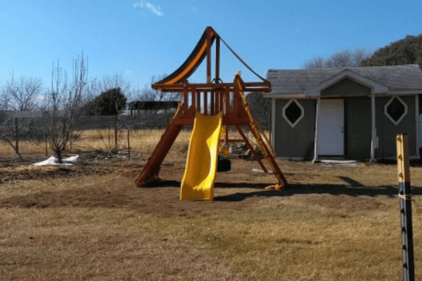 This small backyard swing set was build in Austin, TX by River City Play Systems. Let us build your next backyard playset!